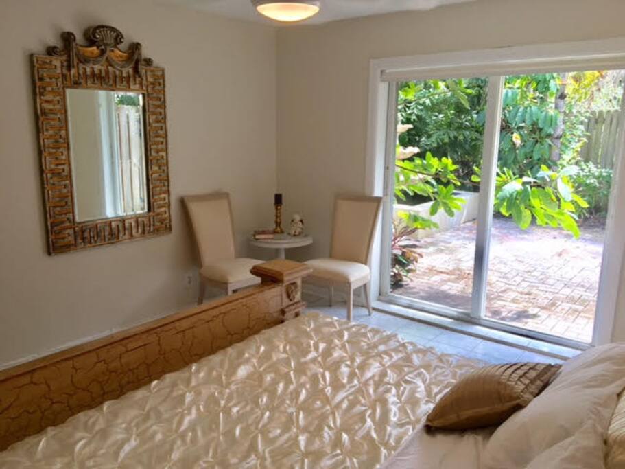 bedroom w view to courtyard garden