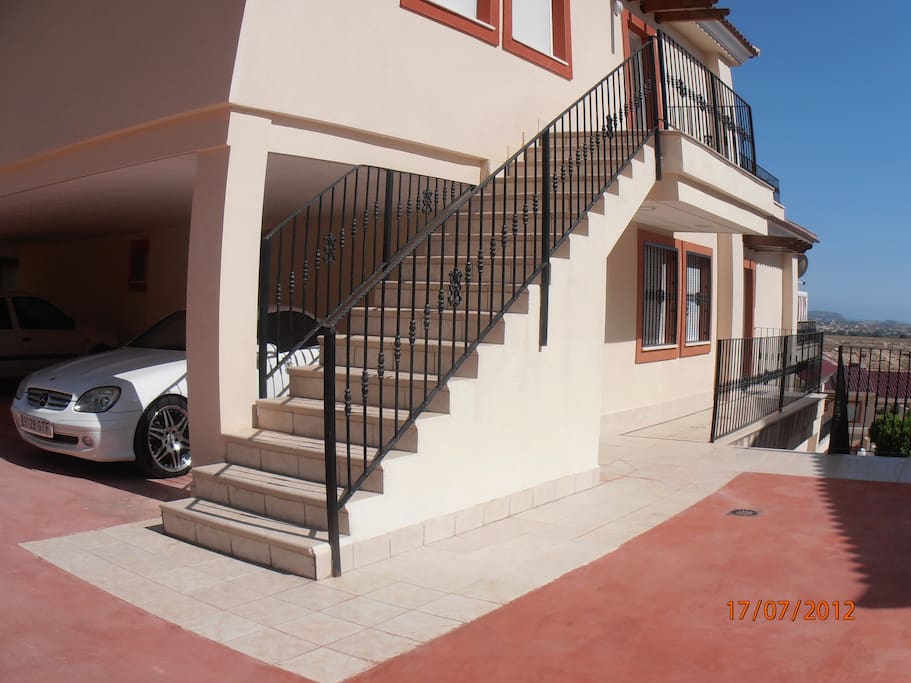 Parking and stairs to front entrance