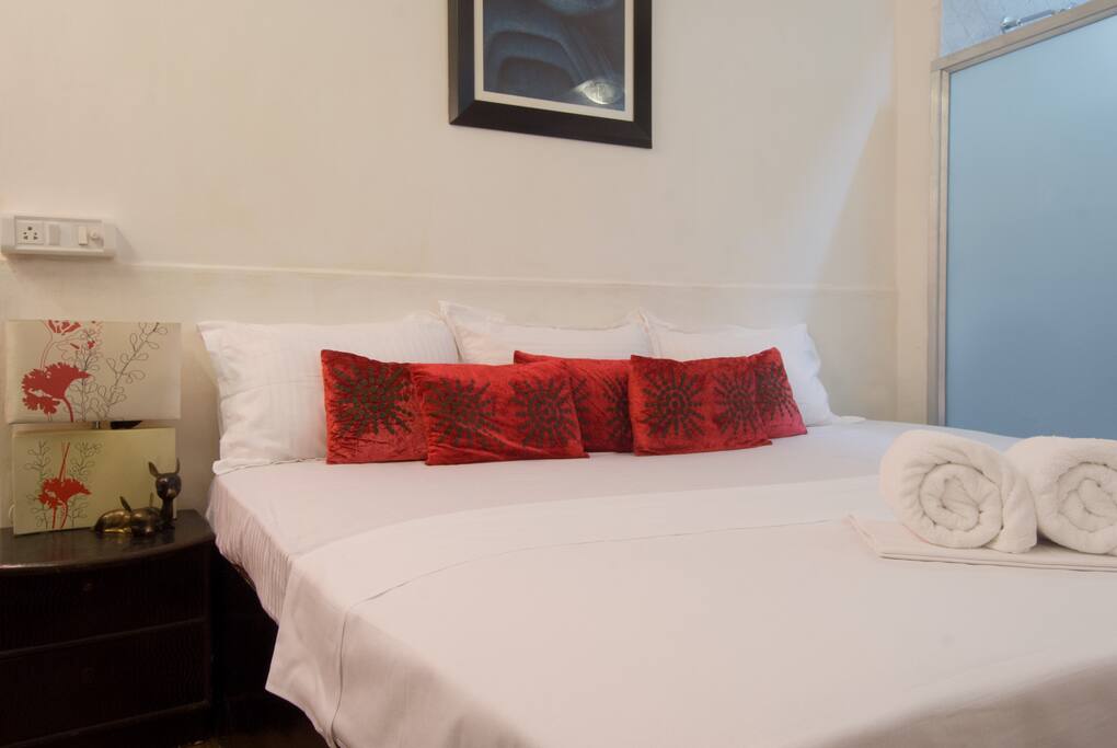 Comfortable 7 ft x 6 ft king size bed. 3 guests can easily sleep comfortably in the king size bed :)