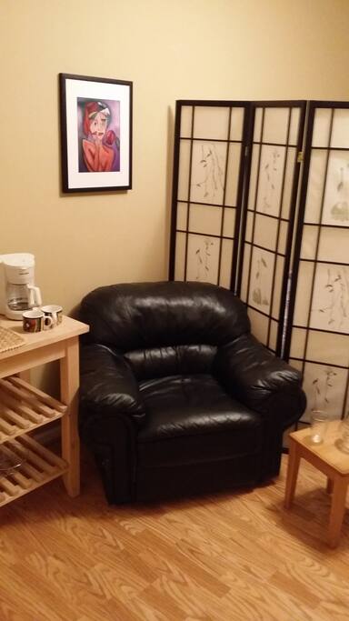 Nice cozy living room area with TV to relax and study.