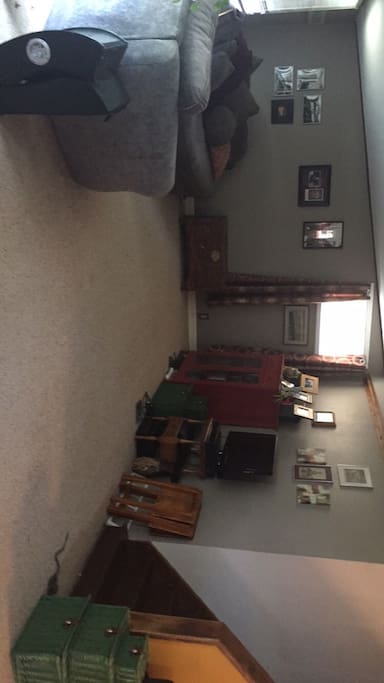 Primary living space with picture windows looking out onto the river.