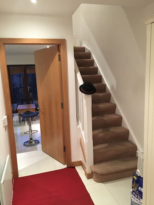The entree with cabinet for your coat and a guest toilet