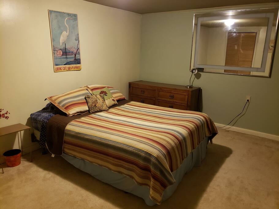 A comfy queen size bed, with pillow topper for a good night's sleep.