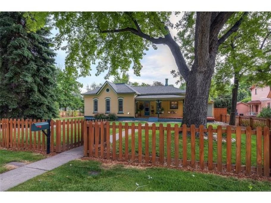 Picket fence in front yard and front gate