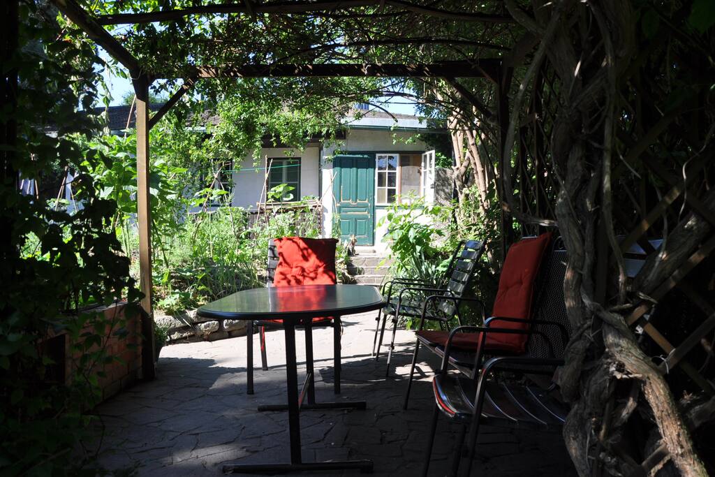 a perfect place to read a book, have a breakfast or lunch, or just enjoy the garden and the bird singing