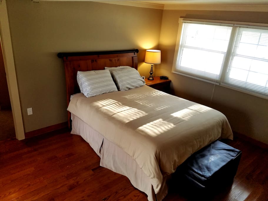 Private bedroom with direct access to deck. Newly installed windows