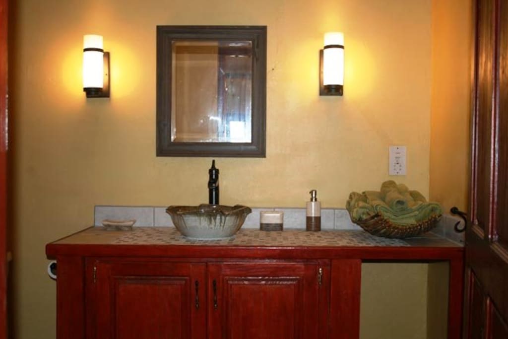 The bathroom also has a large shower