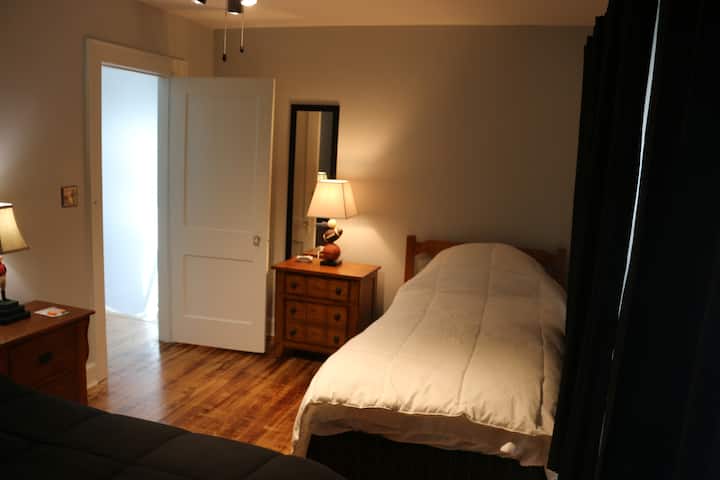 This is one of two twin extra long beds in one of the two bedrooms upstairs.