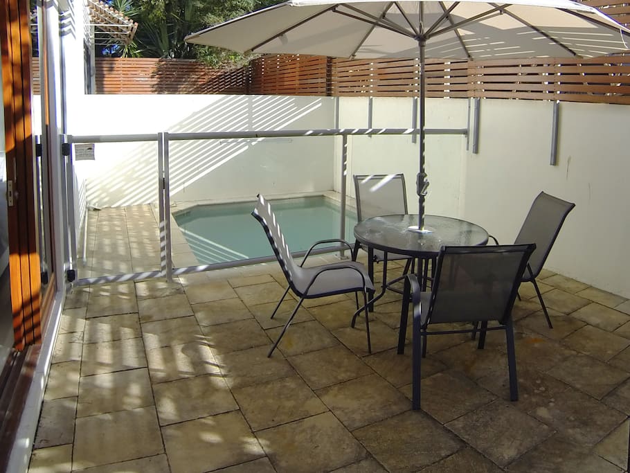 Private plunge pool and outdoor patio/dining area.