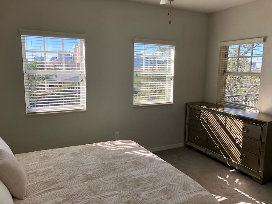 Tons of city views and natural light in the bedroom.