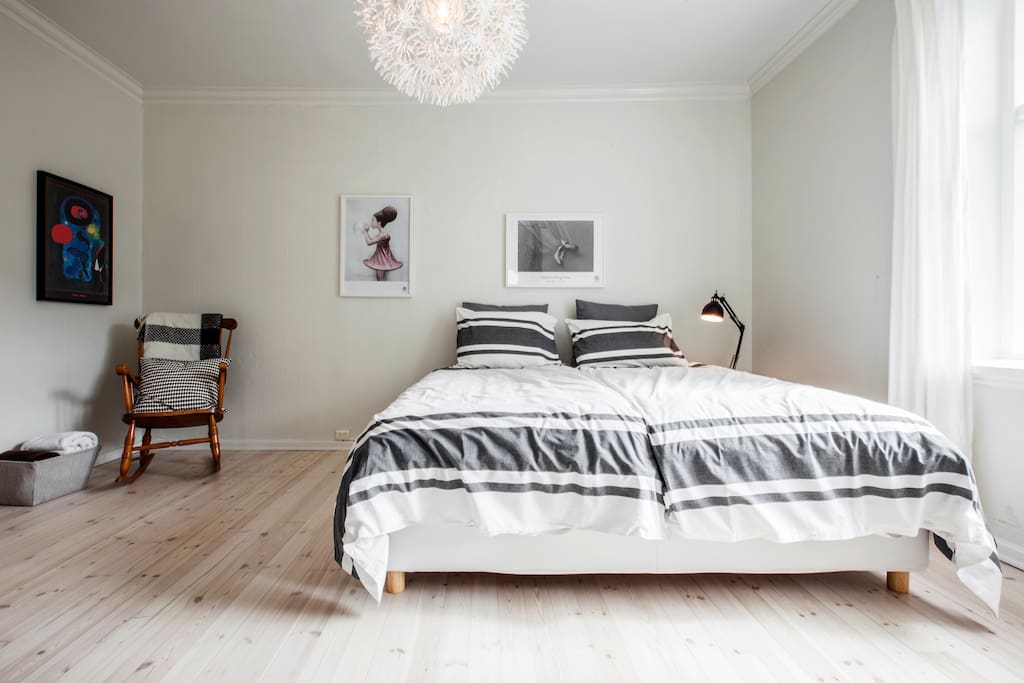 The first bedroom has a king-size bed