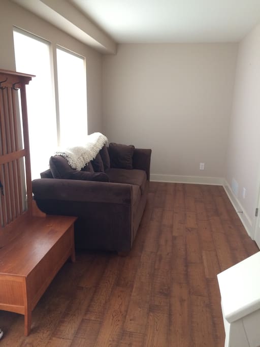 Main entry way between front door and two car garage. Includes sizable closet.