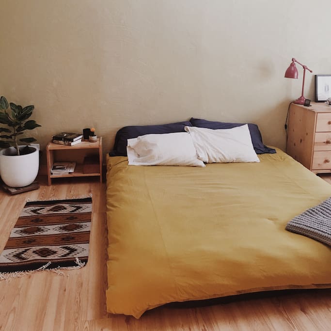 Main bedroom with cozy Cal-King bed and plenty of beautiful light