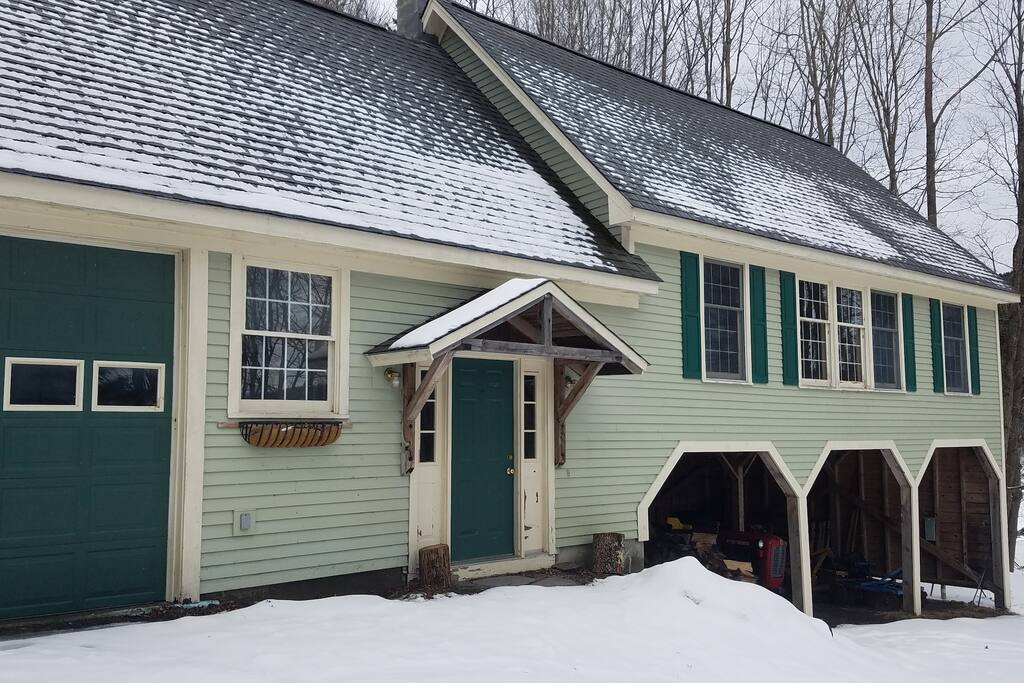 Winter View, Carriage House Exterior from top of driveway looking at entry.