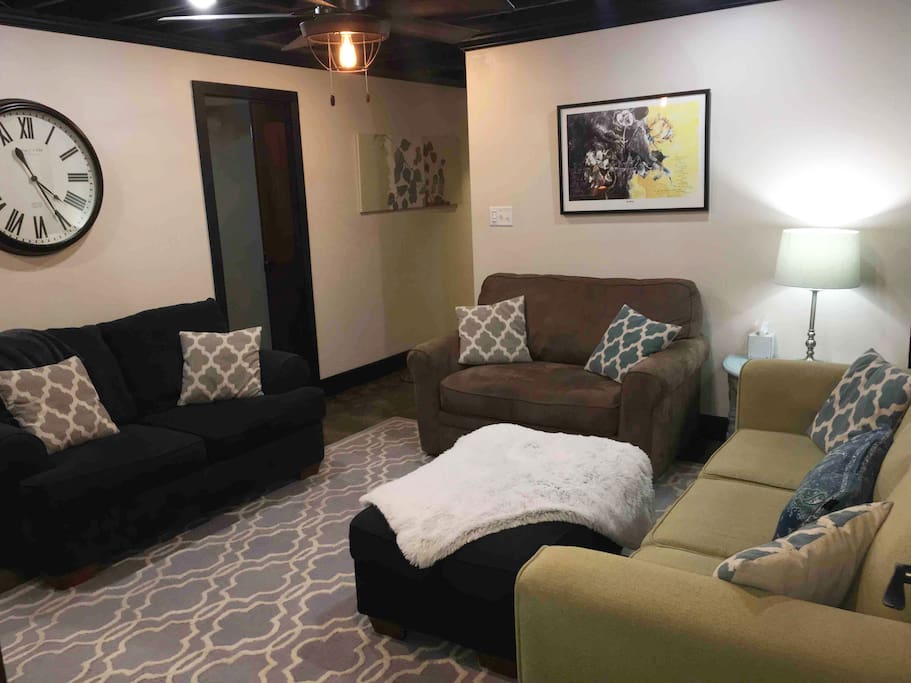 Living Room with comfy sofa, loveseat & XL chair with pullout bed