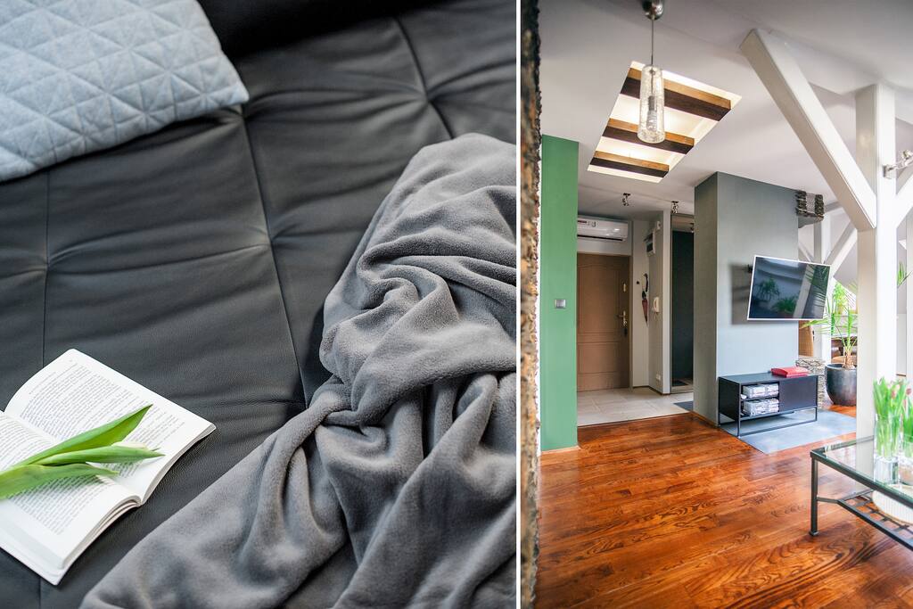 Wygodna sofa, ciepły kocyk w salonie w Ludwinowskim Apartamencie.