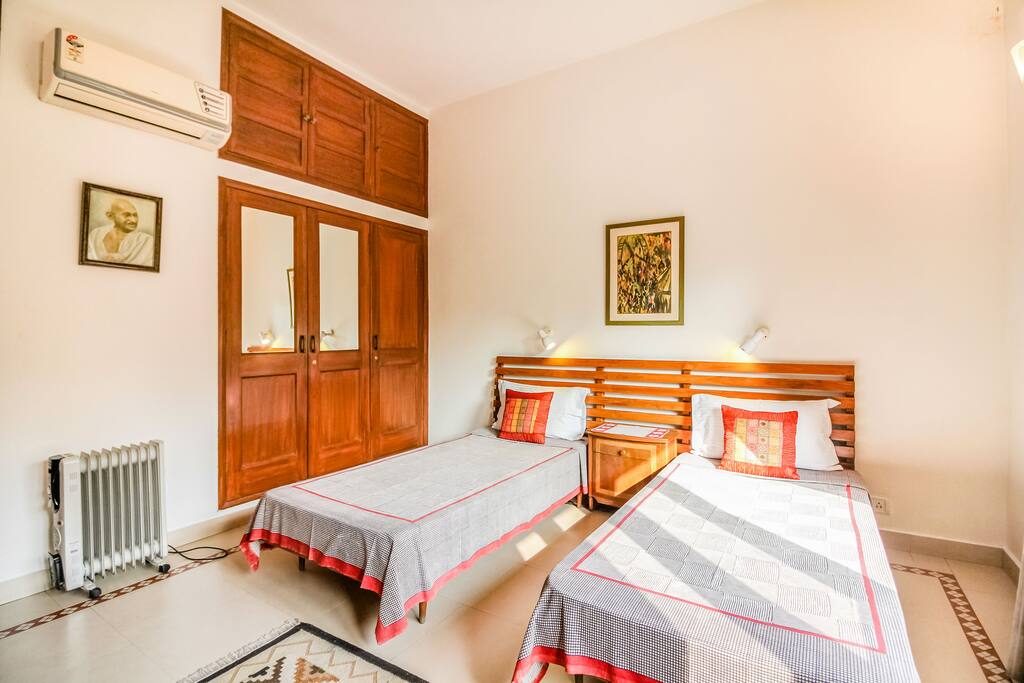 Another view of the beds + Wardrobe