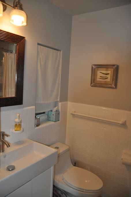 Your small private bathroom with window and good light at the mirror