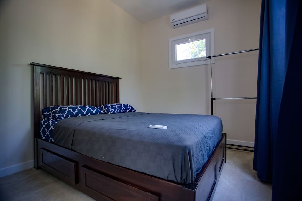 Queen size bed, with storage, air conditioner, large window, patio