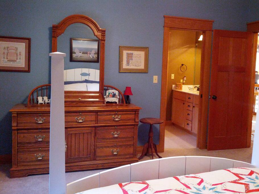 Adjoining your room is a private bath with a tub/shower unit and a double sink.