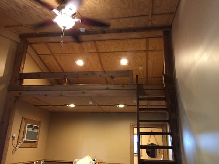 There is a loft for additional guests.   Not suitable for very small children or older adults, but an awesome sleeping space for kids 5 and up. Two twin beds.