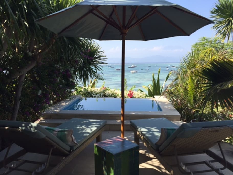 Sun loungers by the private plunge pool
