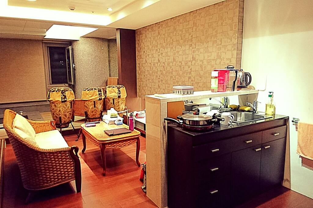 View from area by the door. Kitchenette, living room and hotspring area. Please note some stuff will be moved or removed!