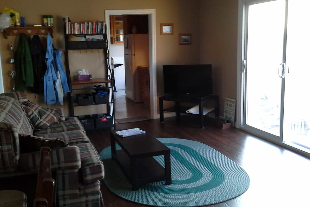 living room with two massive water facing windows
