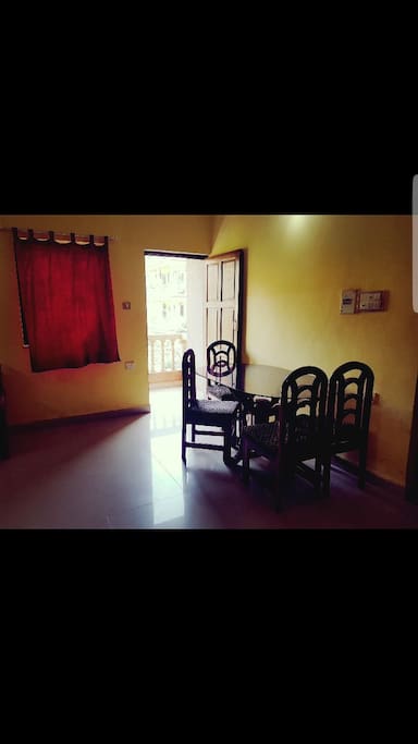 Living area with balcony & dinning table
