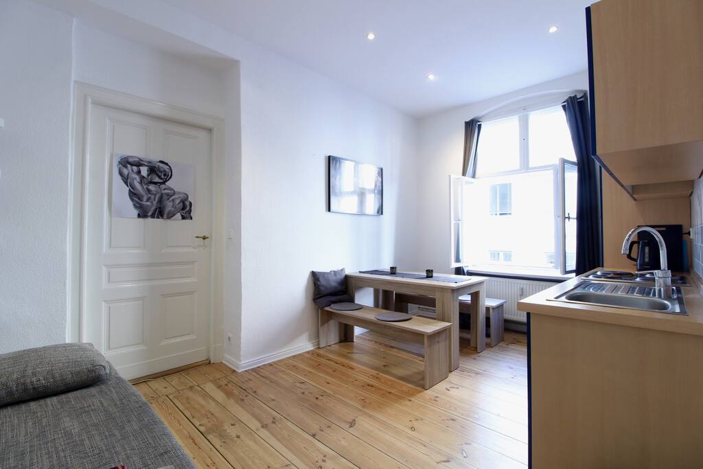 At the dining table in front of the big window, you can enjoy your meals or have some work sessions.