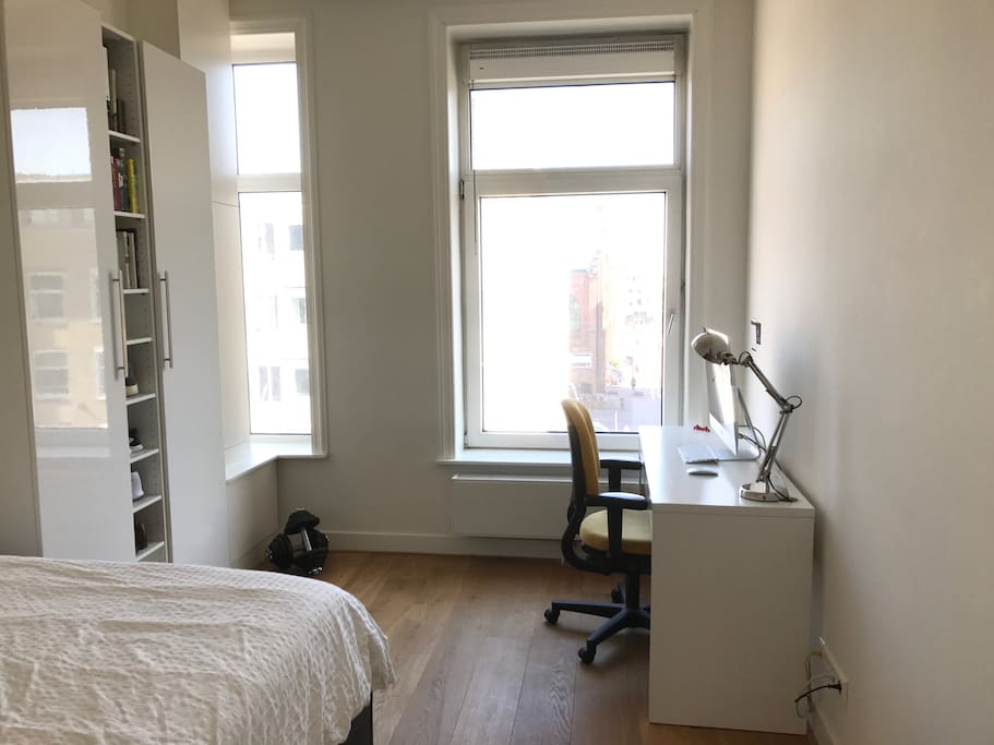A desk and iMac to do your work on or to prepare your Amsterdam Adventure