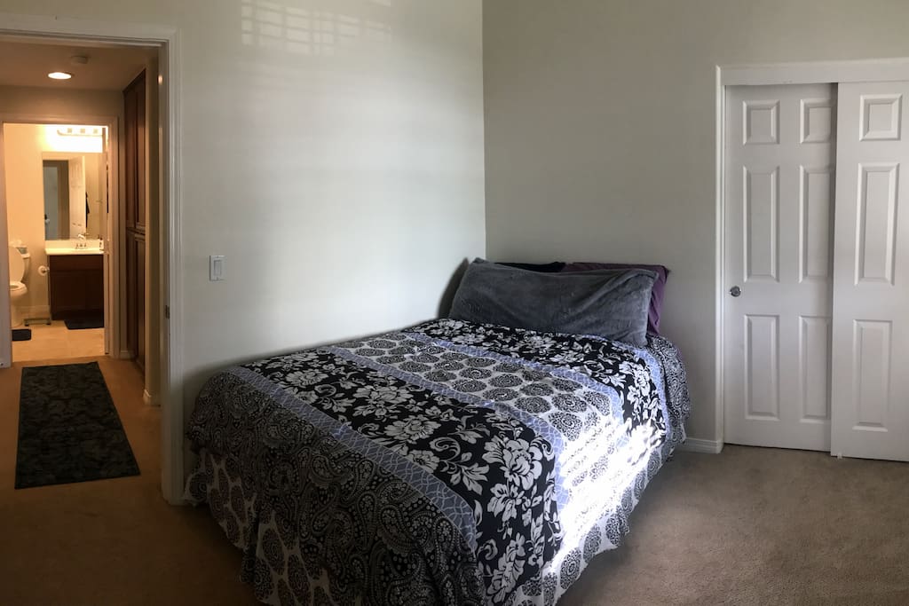 Your bedroom is directly across from the bathroom.
