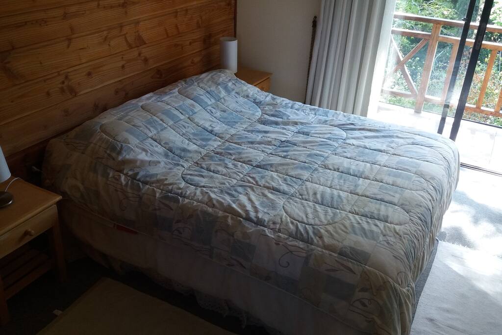 Guest bed with a balcony.