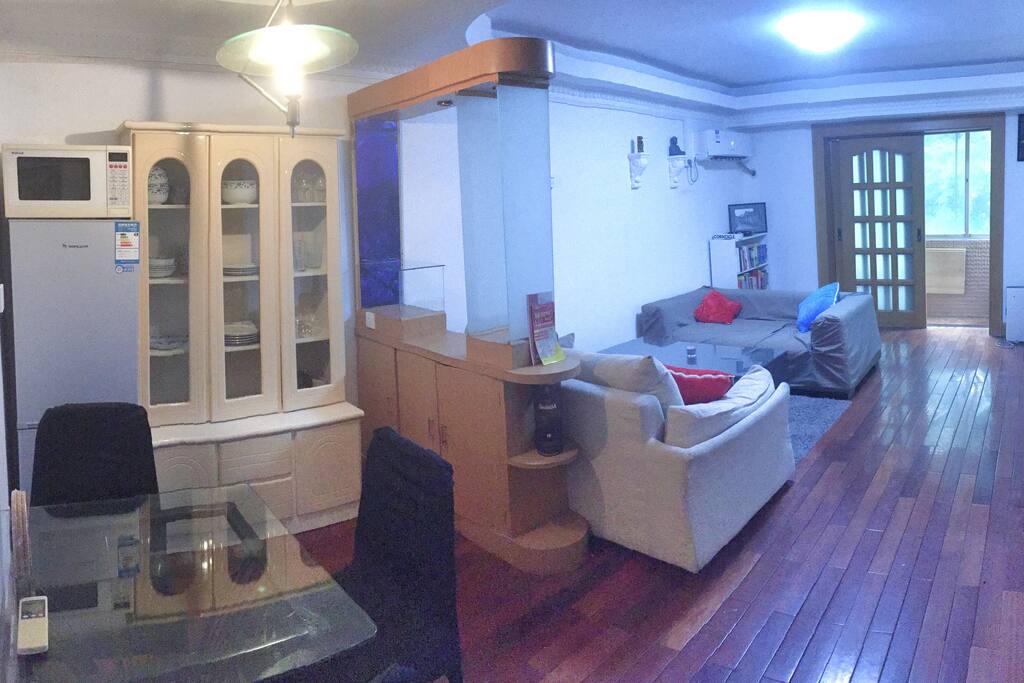 Dinning area, living room and enclosed balcony