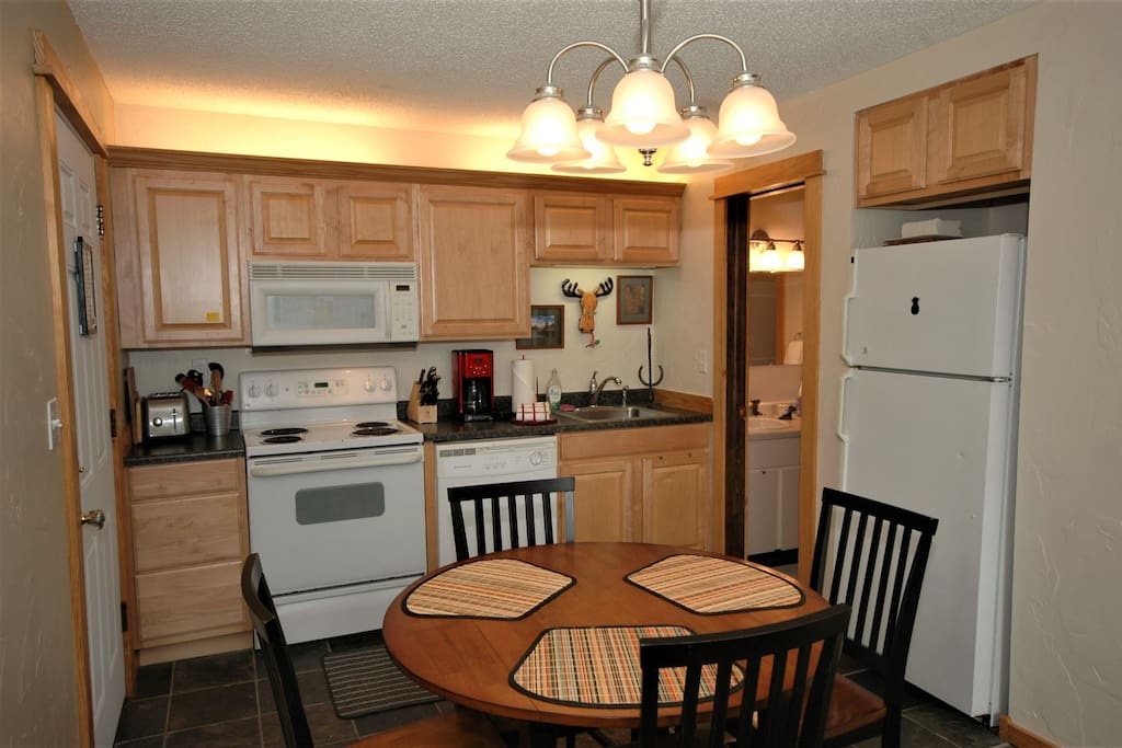 Full kitchen with full sized stove, dishwasher and all the comforts for the chef