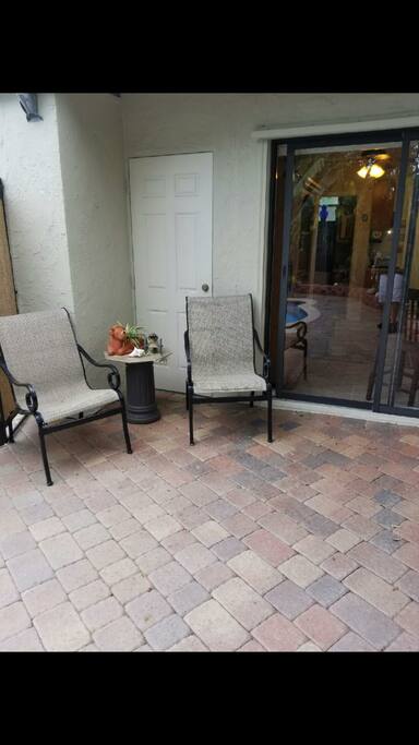 Seating area by pool.