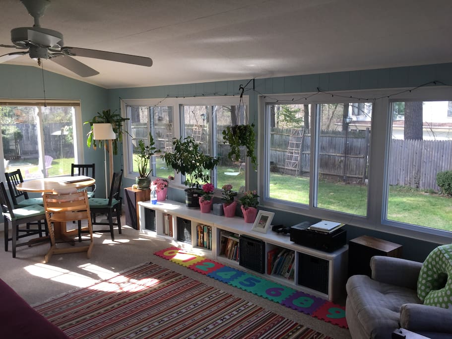 4-season sunroom with queen size sleeper sofa