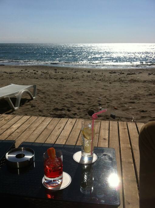 Beach bar 1 min walk away