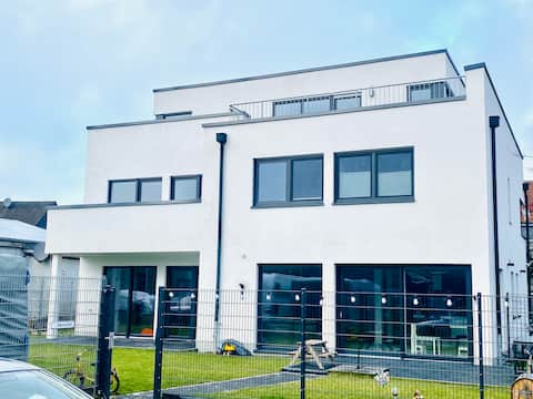 New semi-detached house with terrace, balcony +garden