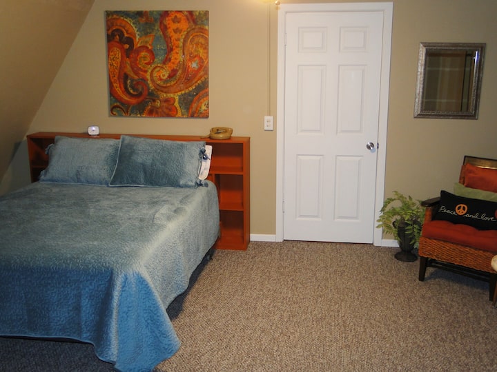 Experience sweet dreams on our  comfy queen size, pillow top mattress. The restored period bookcase headboard is a treasure from a local resale shop where all purchases go to fund shelters for victims of domestic violence.