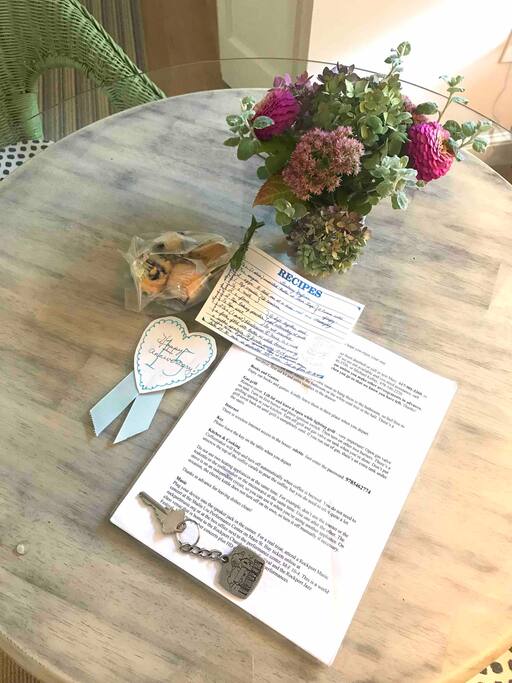 Flowers, baked goods and a recipe = warm welcome.