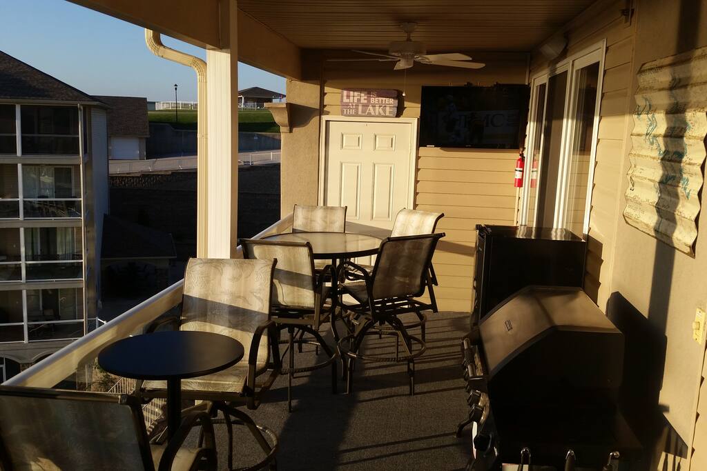 Seating for 8 on the patio . TV, gas grill and surround sound speakers