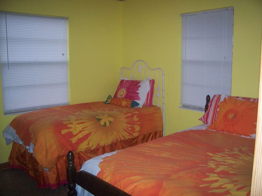 One bedroom with a double bed and twin bed