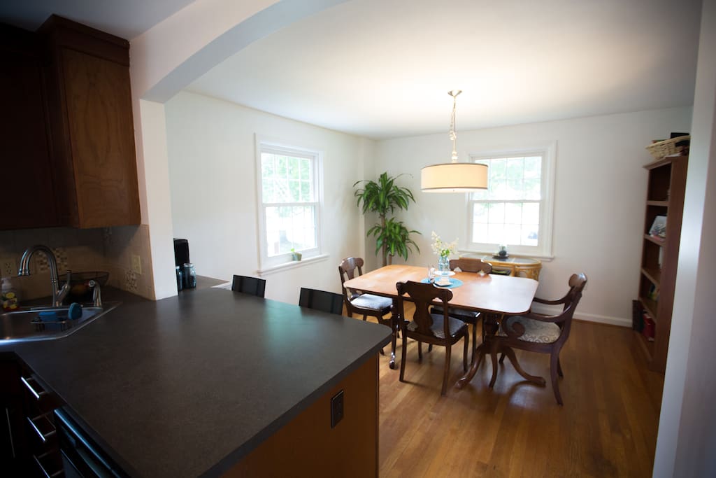Dining room with bar seats and coffee nook.