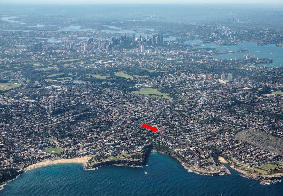 We're close to the beach, clifftop walks, and city. (Coogee Beach, Gordon's Bay and Clovelly Beach left to right in this pic.)