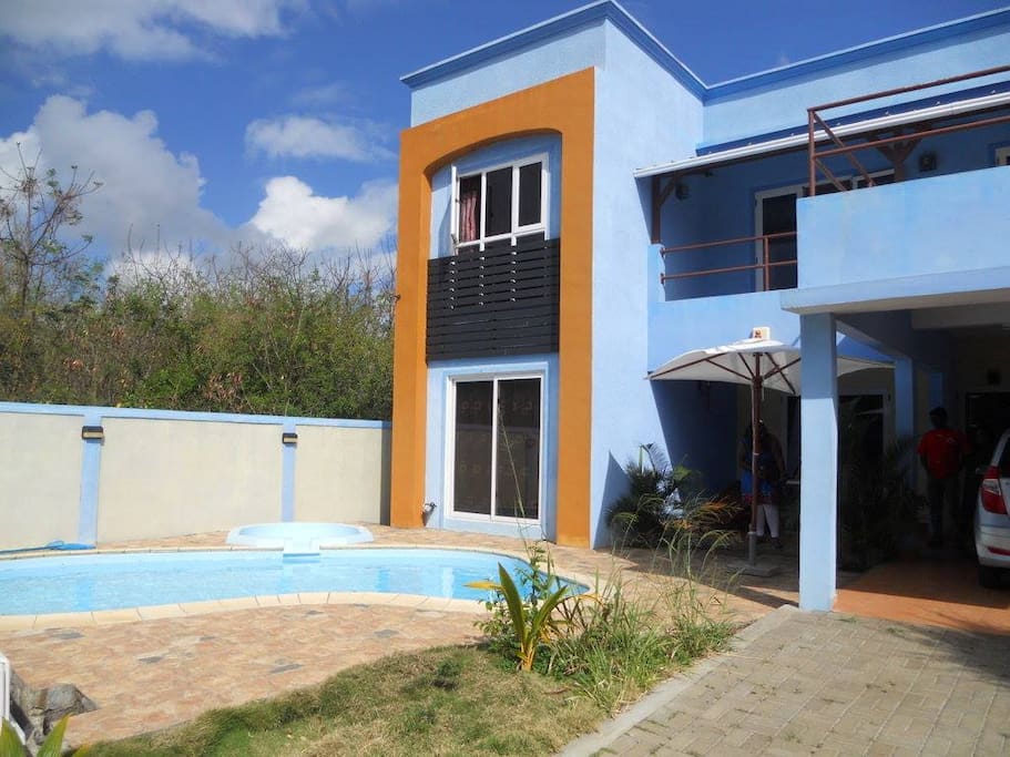 The Villa front view which has a Private Pool and Parking space.