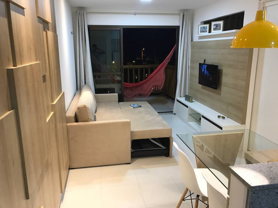 Sala com sofá cama
