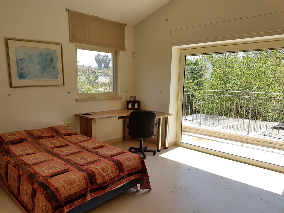 the room with the balcony