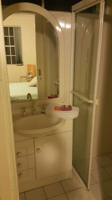 Private ensuite with toilet and shower