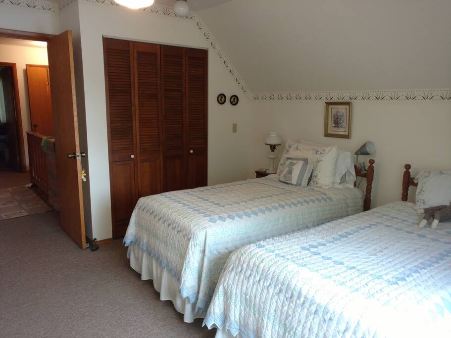 Master bedroom overlooks Bass Lake.